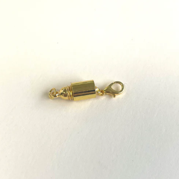 Magnet with screw clasp