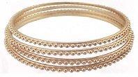 Set of 4 Gold Tone Bangles with Beaded Texture